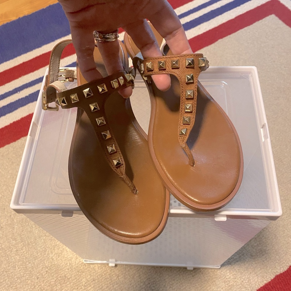 Brown Michael Kors sandals. Size 10. Well-worn but still with life in them. $25